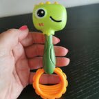 Plastikust tamburiini ja kõristi komplekt DINO