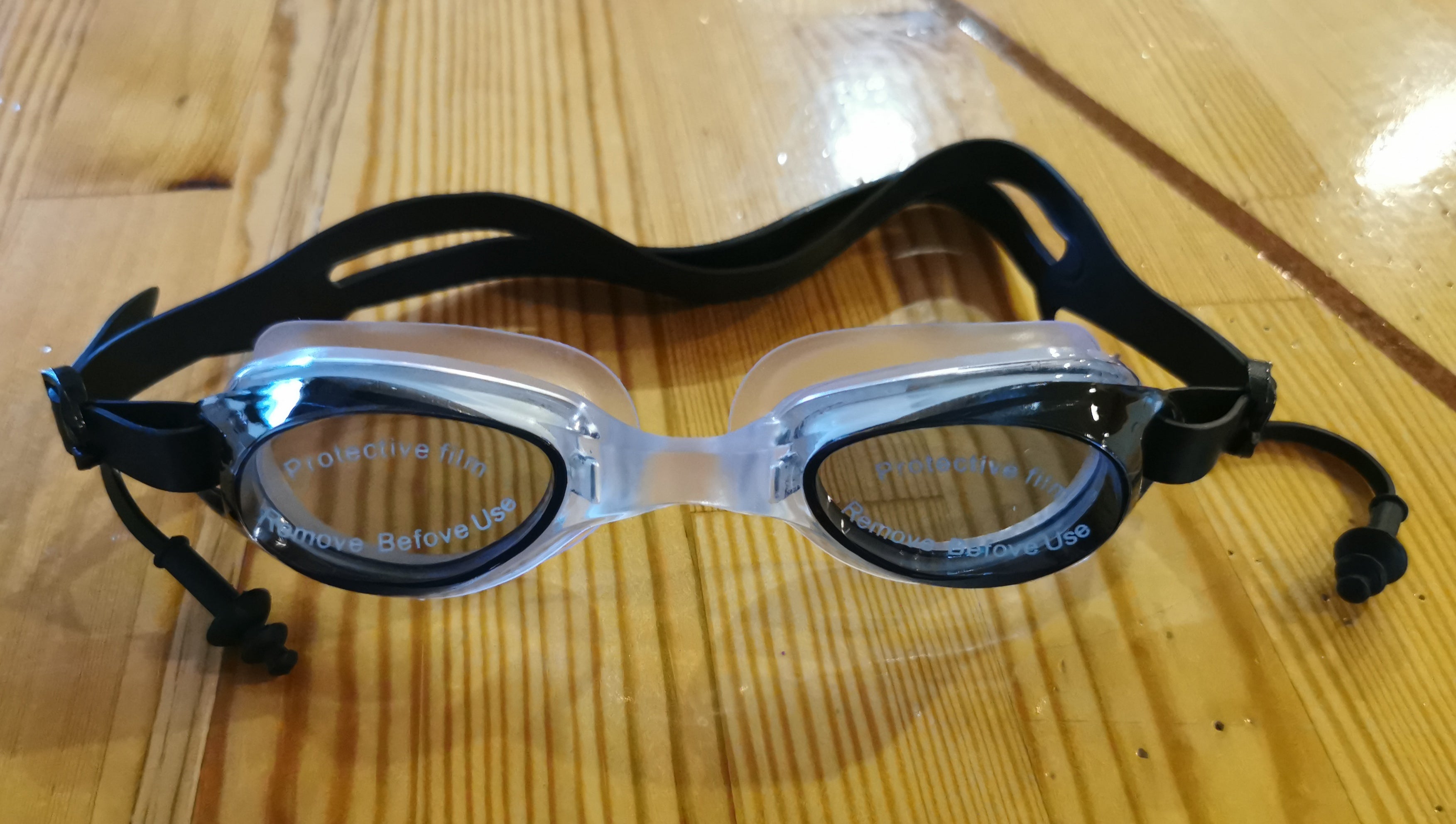 Ujumisprillid kõrvatroppidega