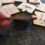 Puidust numbrite ja loomade pusle