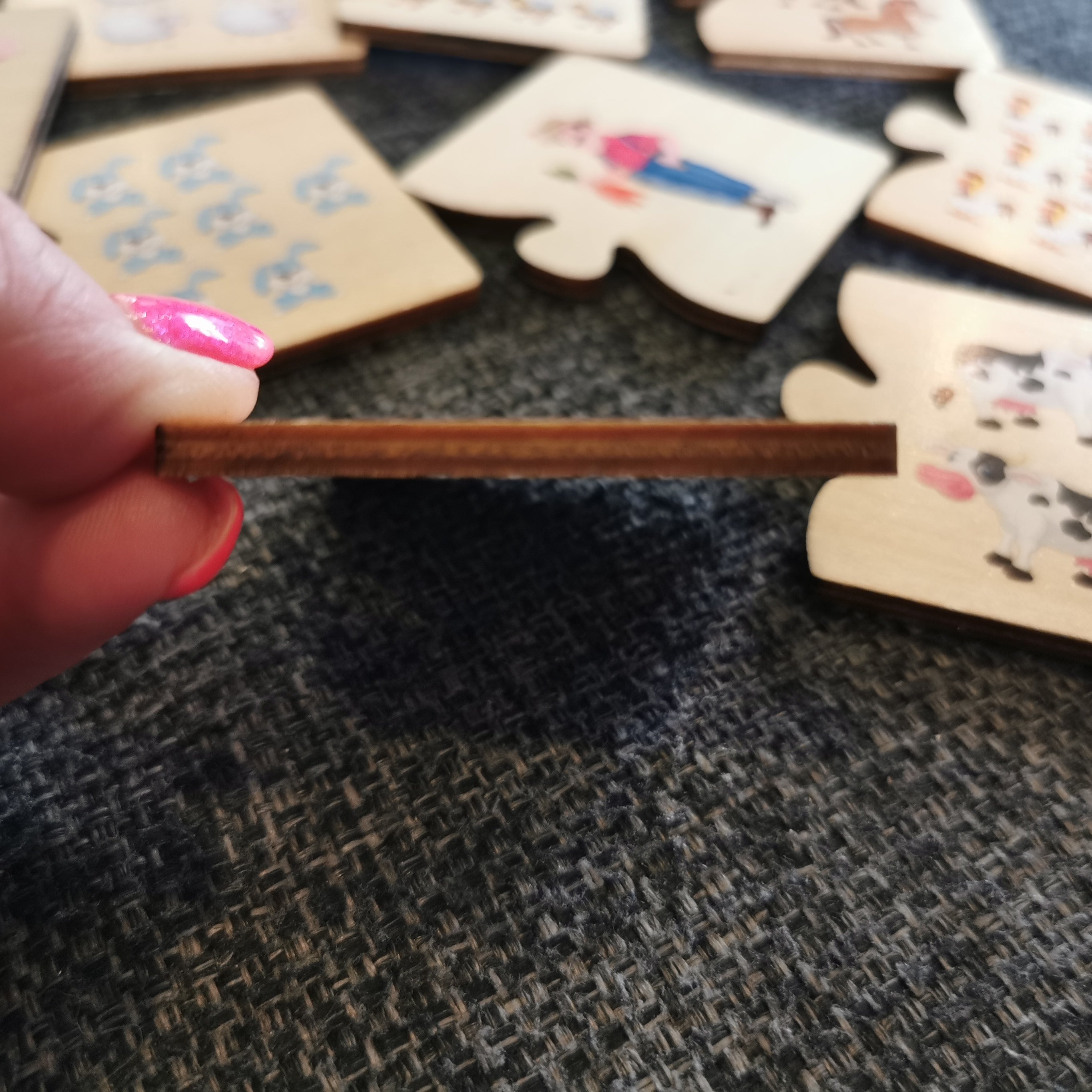 Puidust numbrite ja loomade pusle