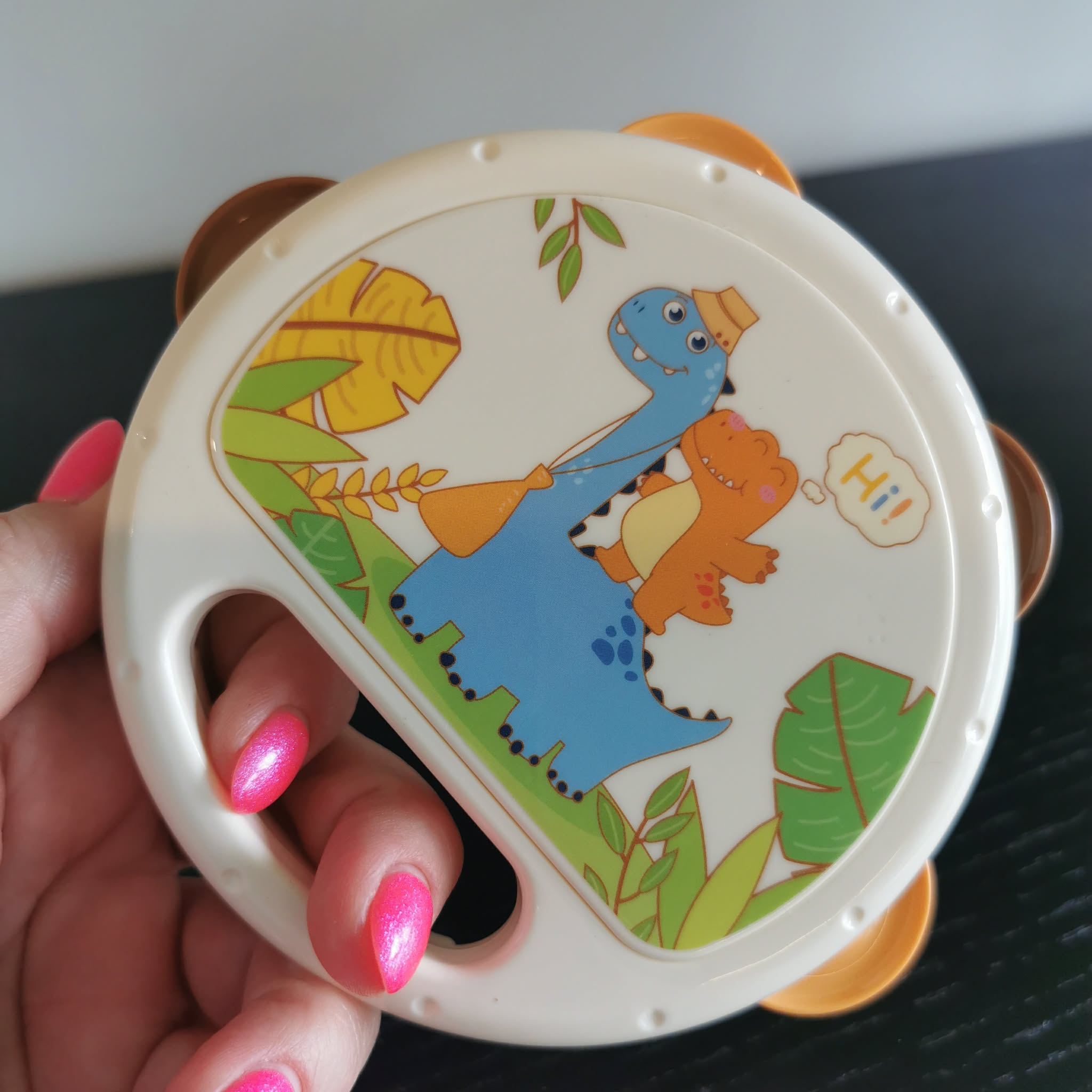 Plastikust tamburiini ja kõristi komplekt DINO