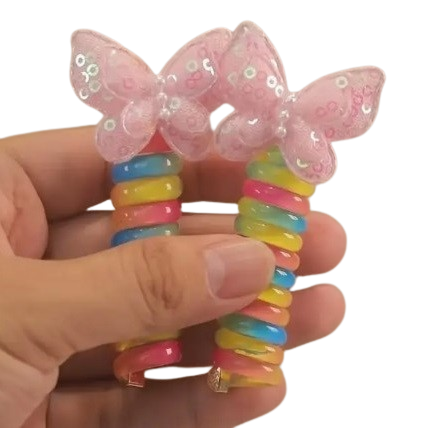 Spiraalsed kaunistused hobusesabale, 2 tk (lill/liblikas)